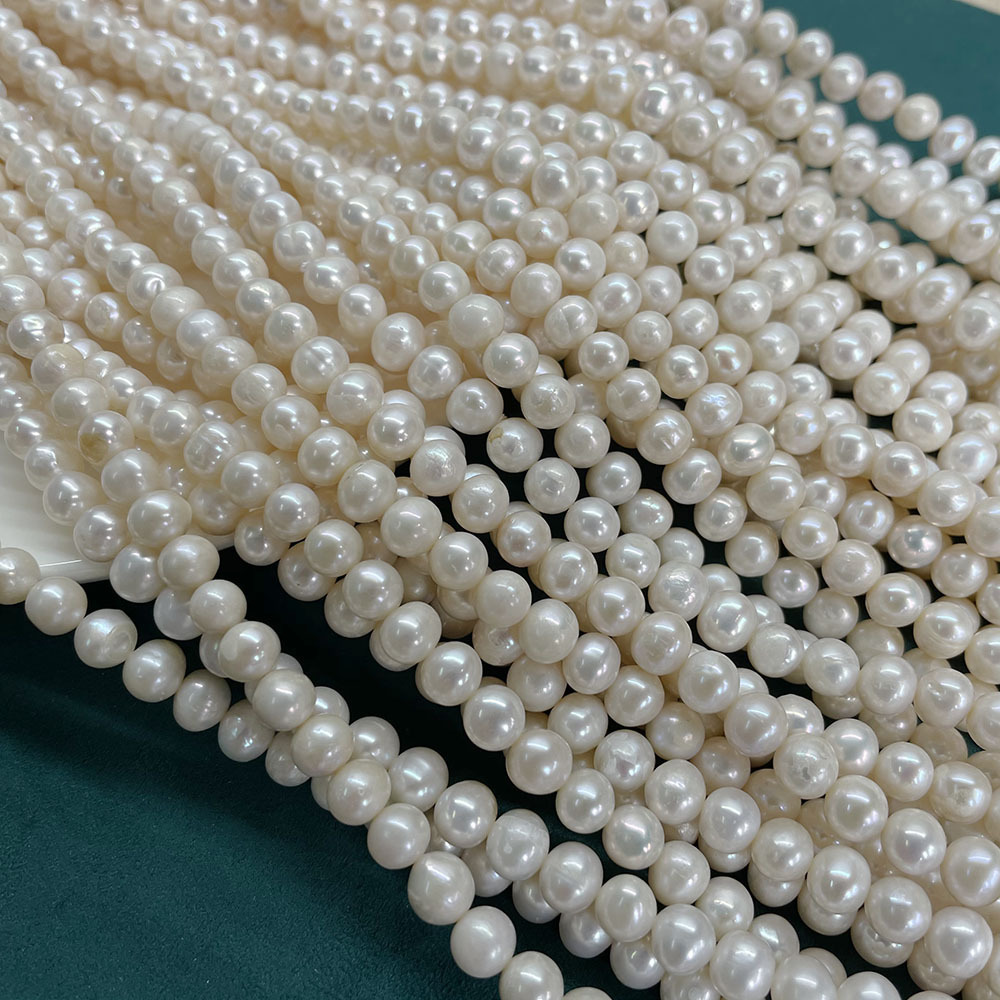 4:White with certain blemishes, about 54 beads/strand