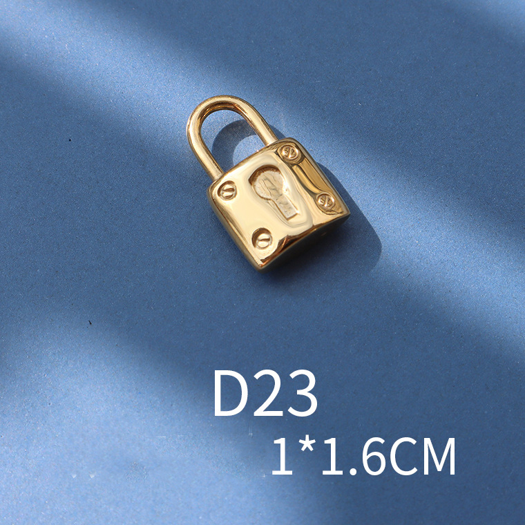 2:D23 golden key lock 1x1.6cm