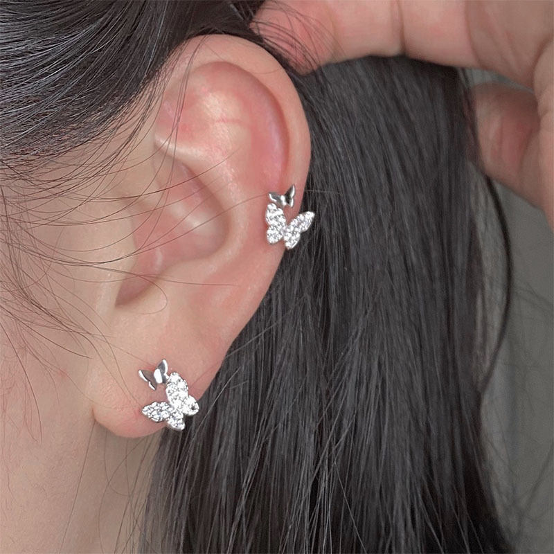 3# One silver double butterfly earring