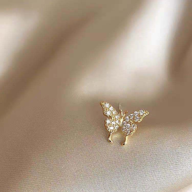 6# One silver double butterfly earring