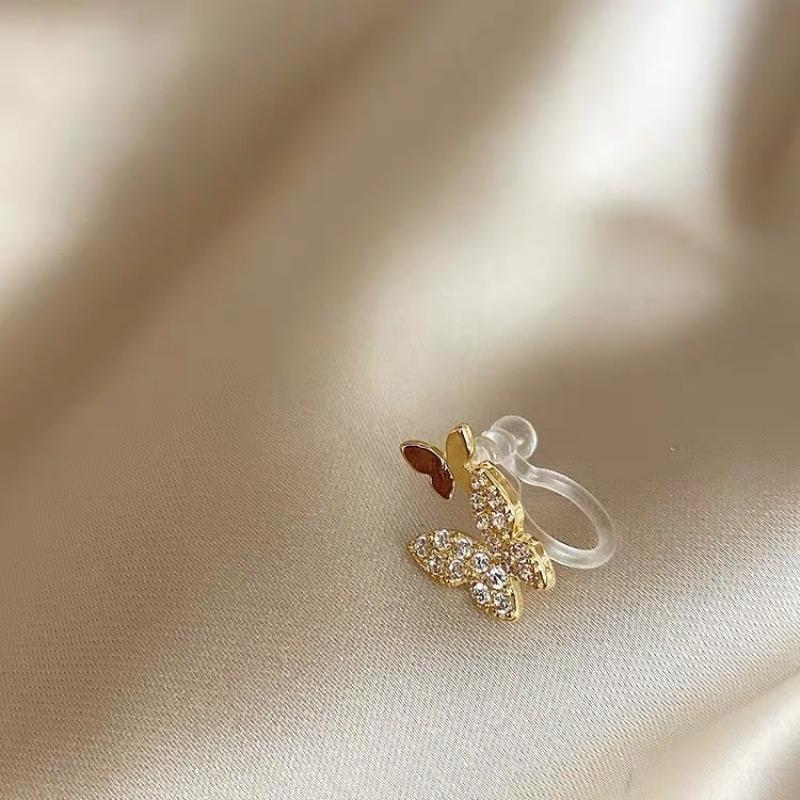 7# One golden double butterfly ear clip