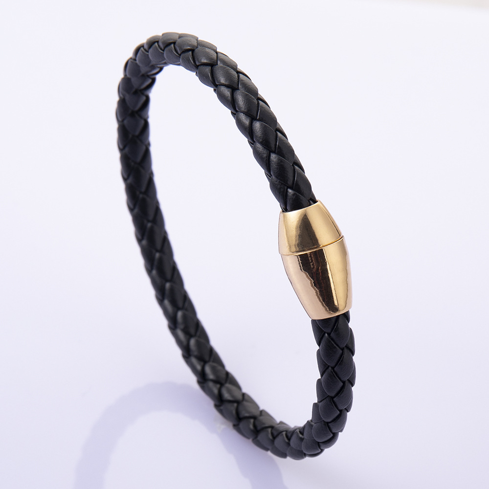 Gold buckle   black rope