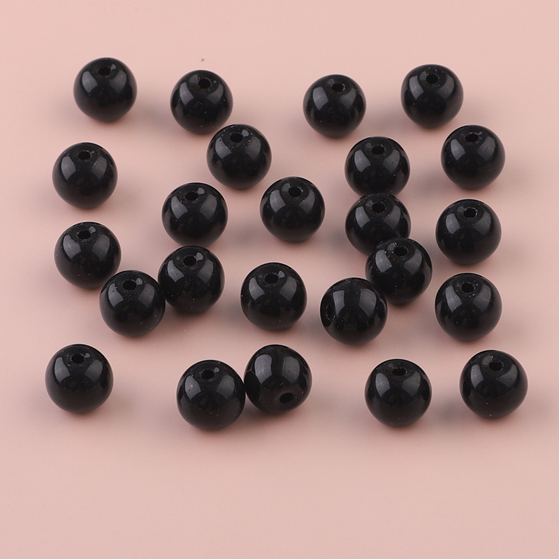 About 52 black beads 6mm/pack
