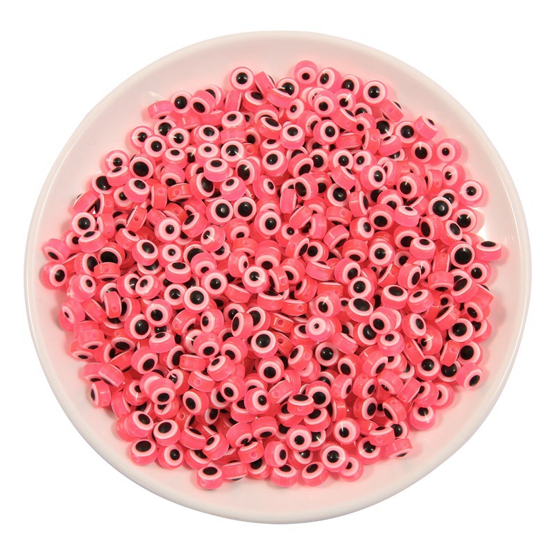 Dark pink diameter about 8mm thickness about 5mm a