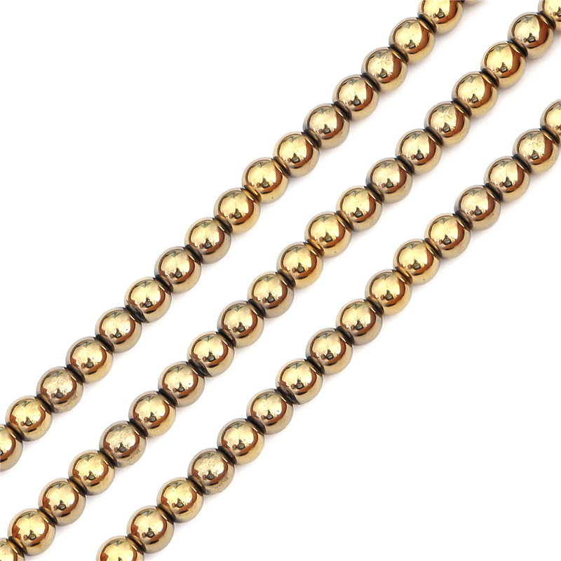 Electroplated KC gold balls 6mm aperture about 1mm