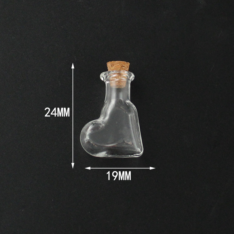 Clear deflated vial with cork