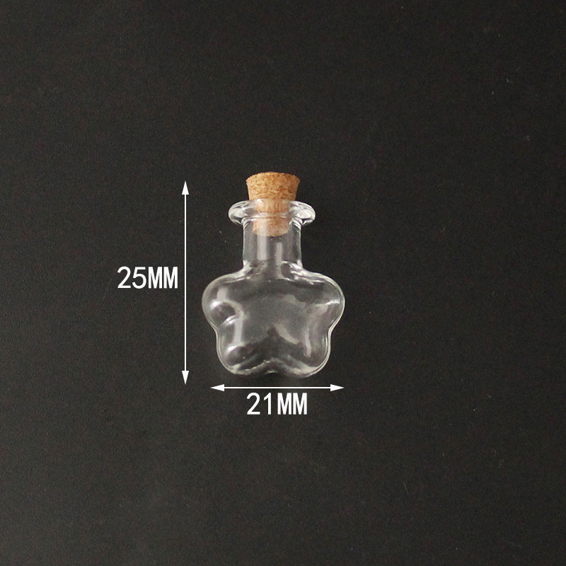 Transparent quincunx vials with cork