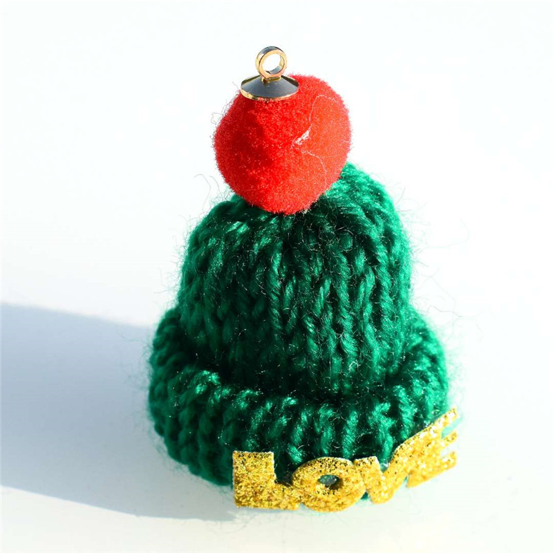 Christmas hat with hanging green, 30x48mm