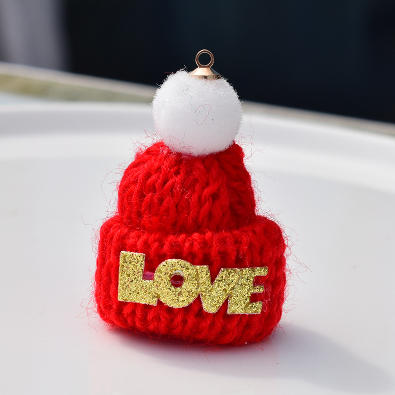 Christmas hat with hanging red, 30x48mm