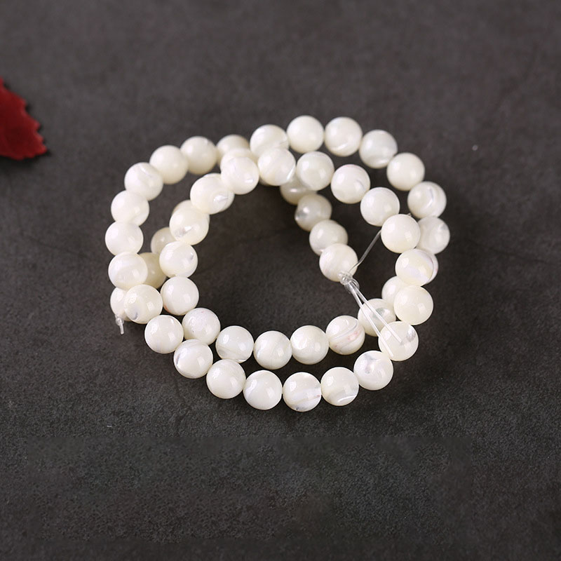 Natural white scallops 8mm, 48 pieces/piece