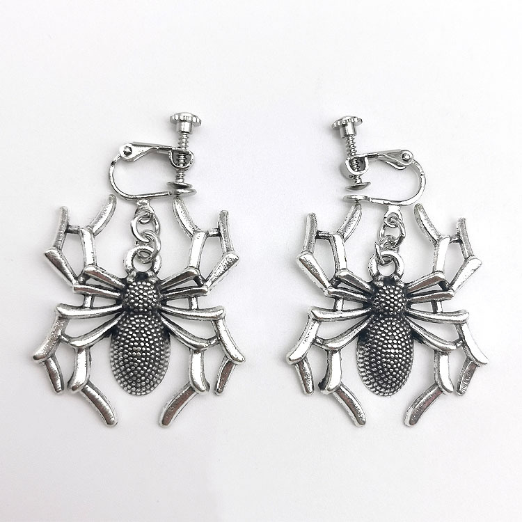 A pair of spider ear clips