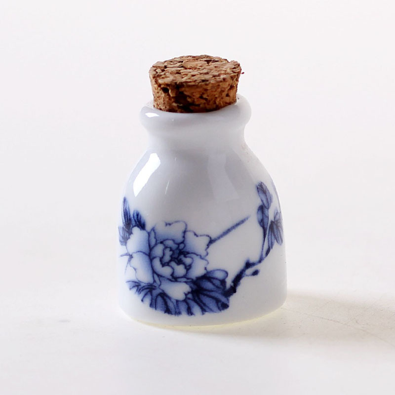 Round vase with blue peony