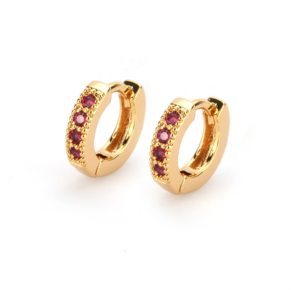 Gold-plated red zircon