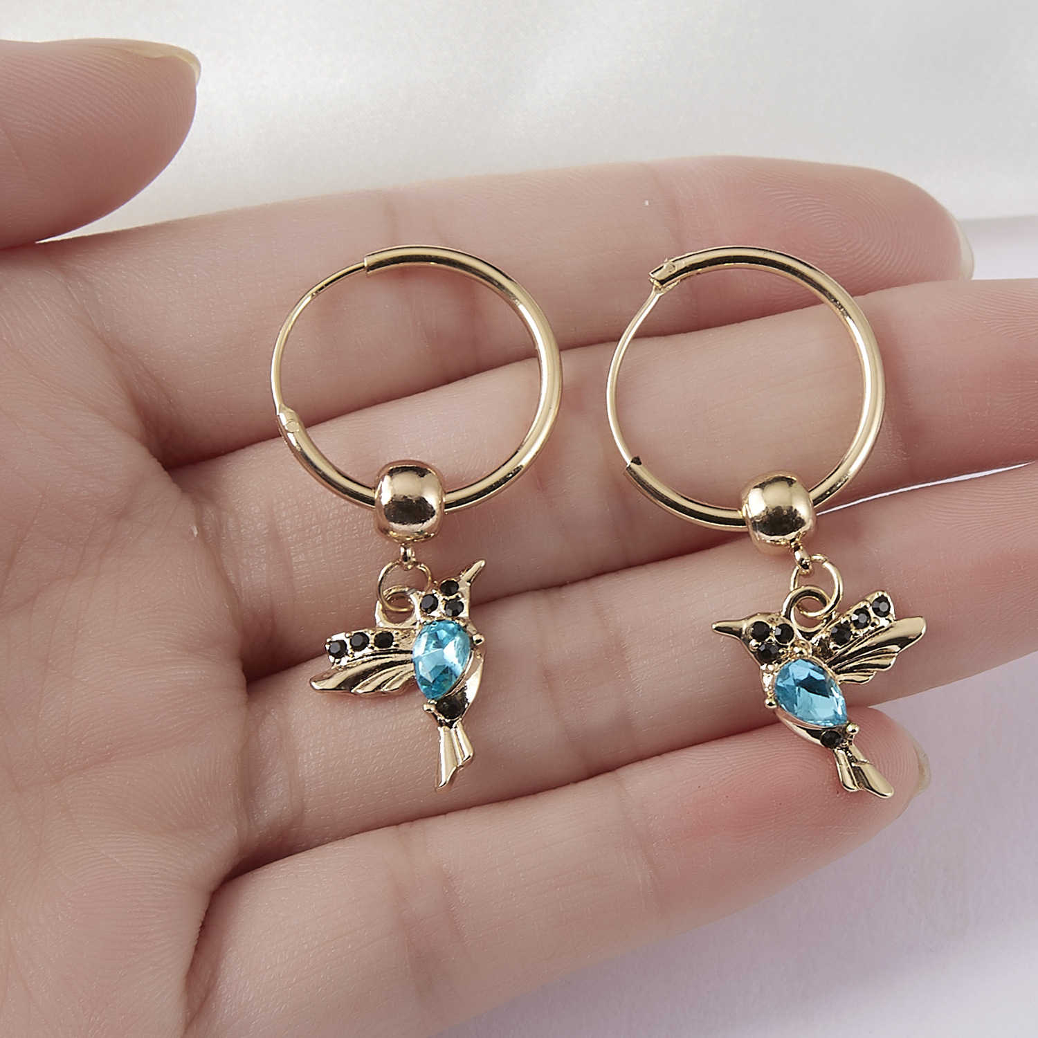 Blue hummingbird earrings