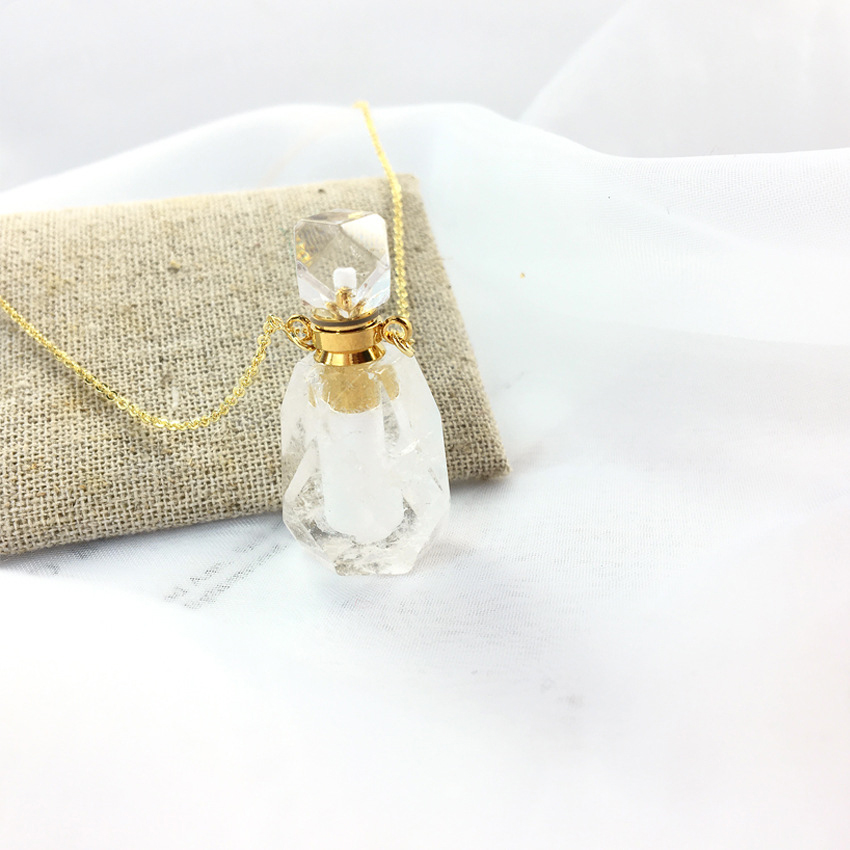 White crystal perfume bottle + chain