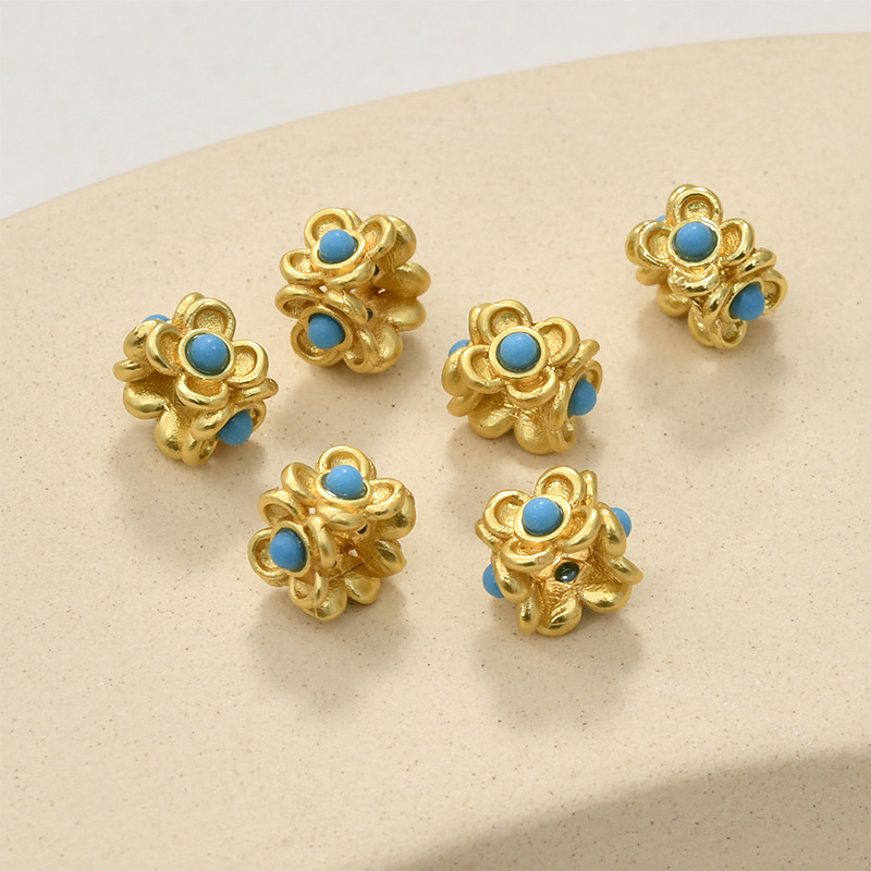 Imitation turquoise four-sided flower 9x6mm