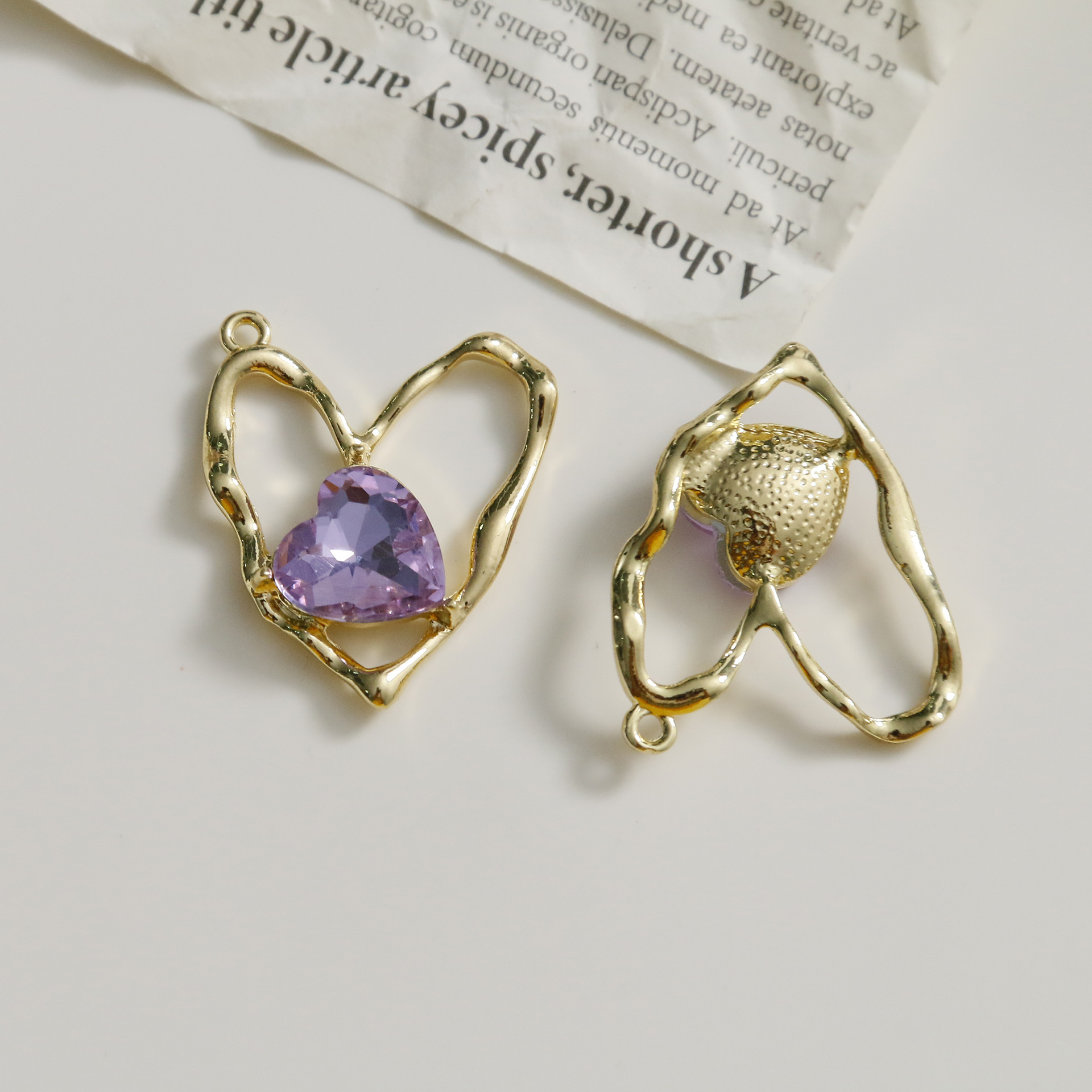 Hollow gold color plated with Amethyst crystal 30*