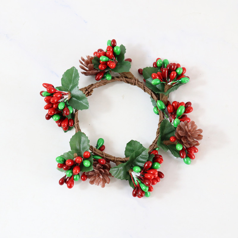 Red and green simulated pine cone candle ring