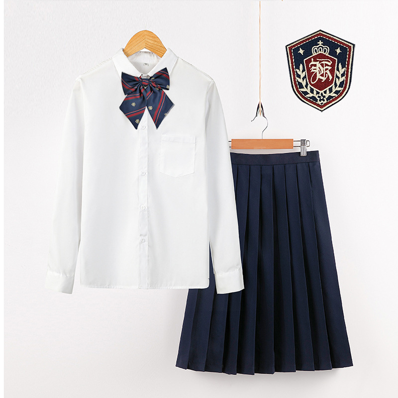 Female white long sleeve   navy blue pleated skirt