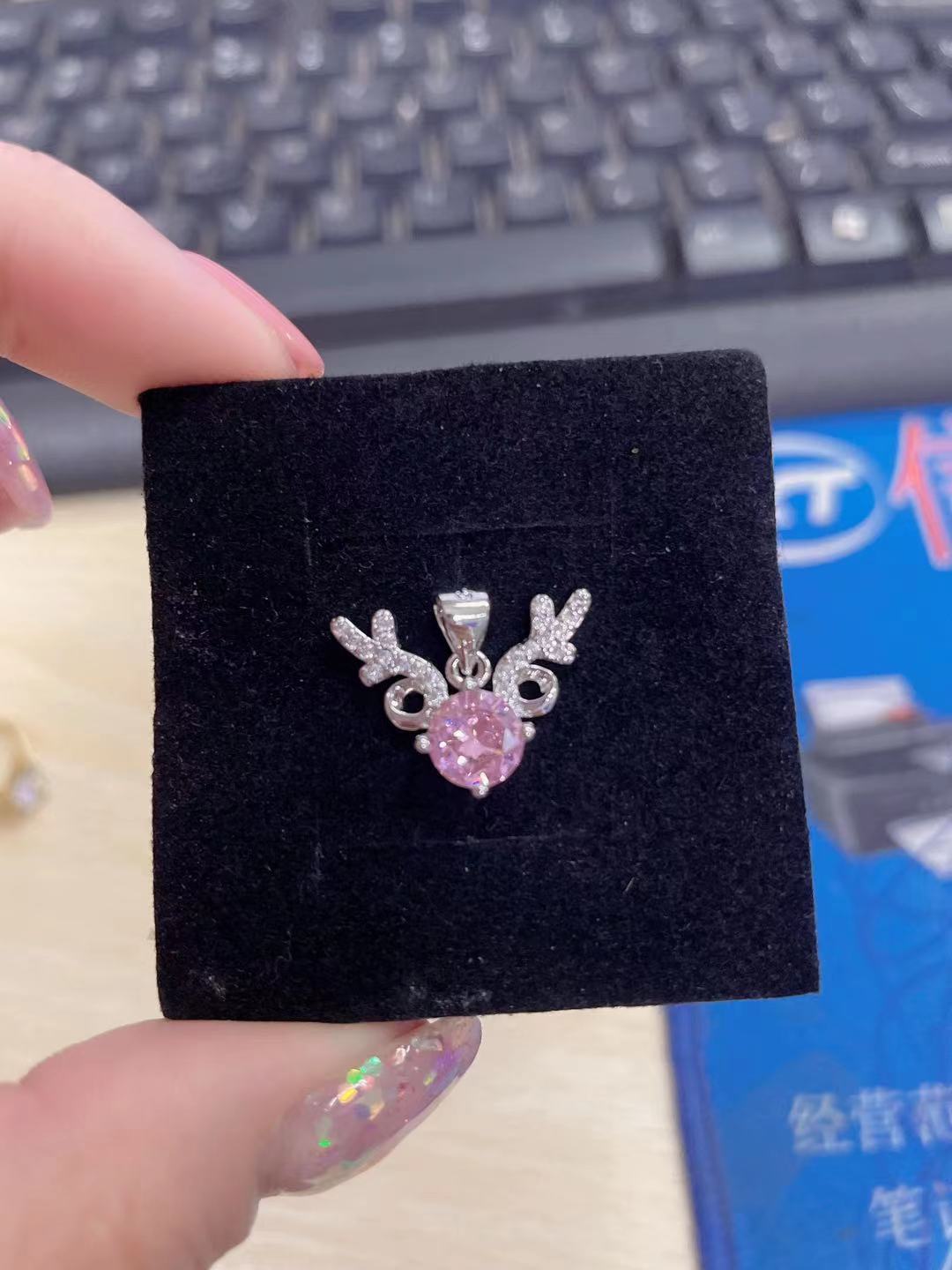 Single pendant with pink rhinestone