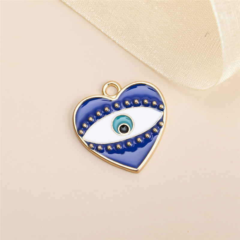 6:10 small blue heart shaped eye pendants 25x24mm