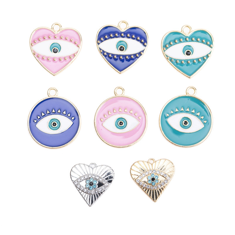 10 mixed love round eye pendants