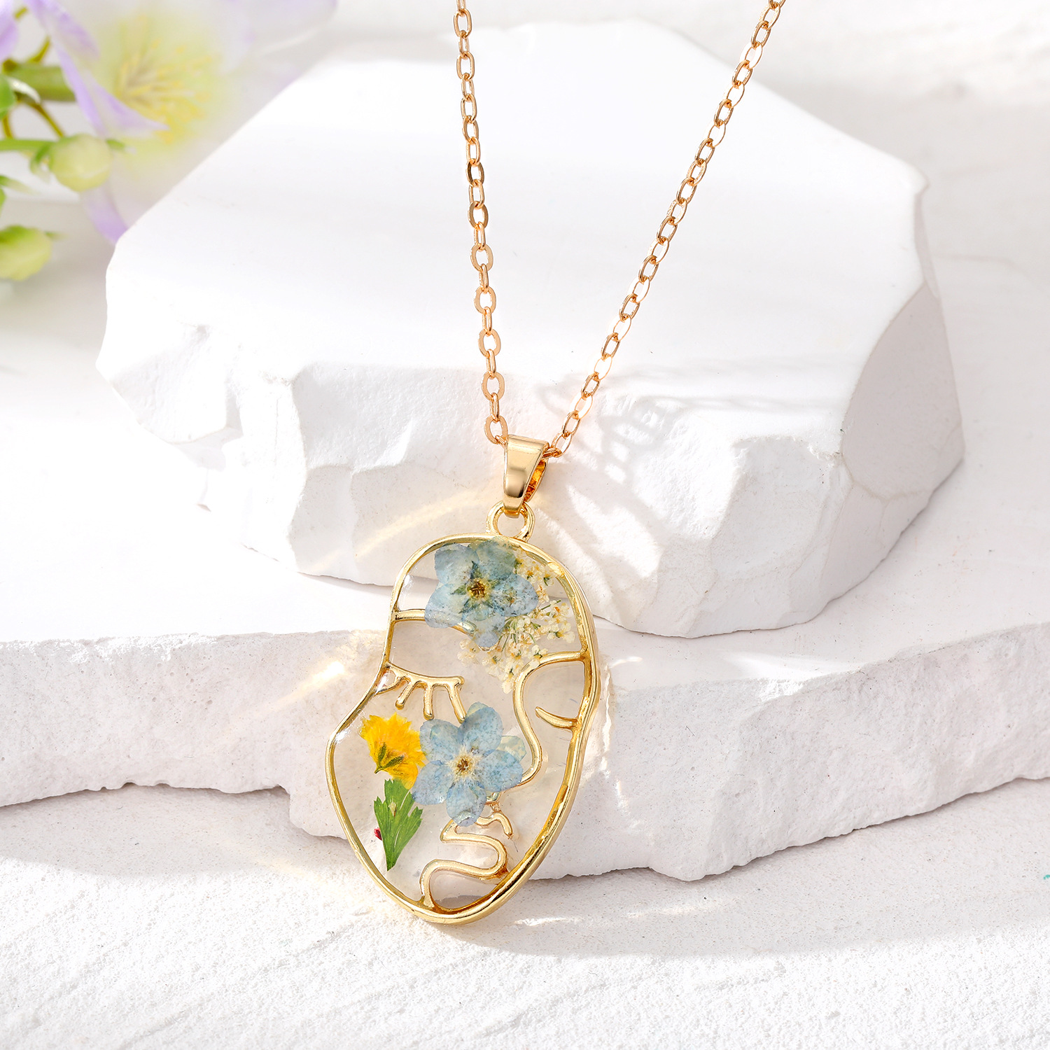 4:Golden face light blue flower necklace