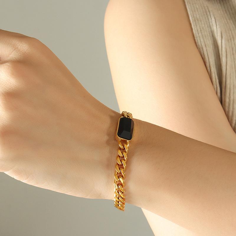 Gold black glass stone bracelet