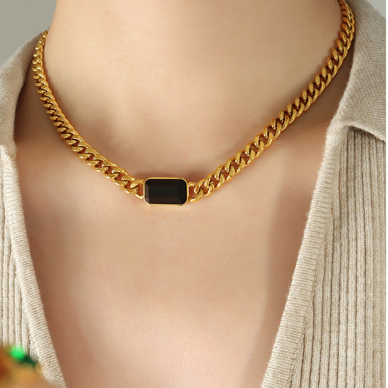 Gold black glass stone necklace