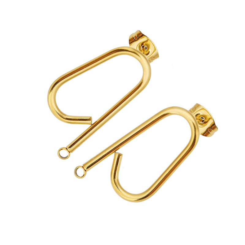 Q-shaped earrings in gold