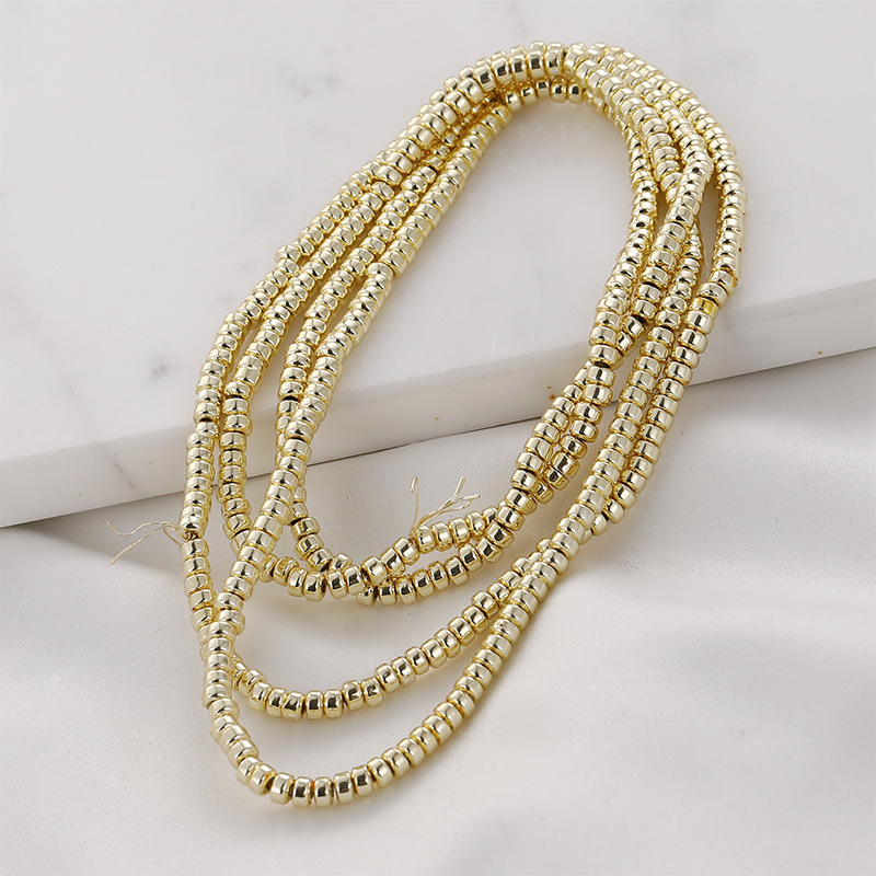 Light gold flat beads [1 about 205 pieces]