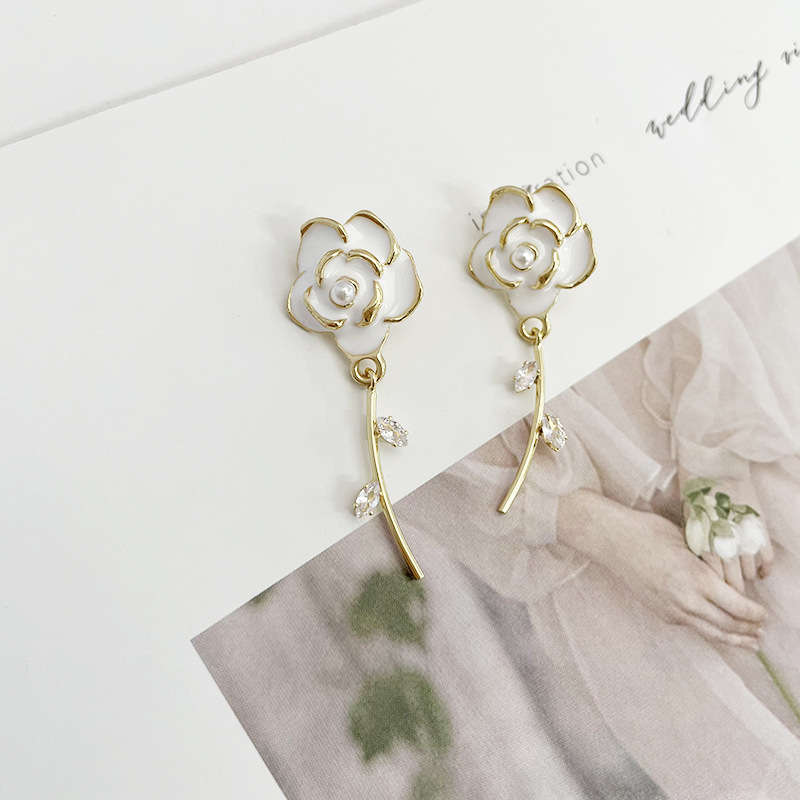 1:White earrings