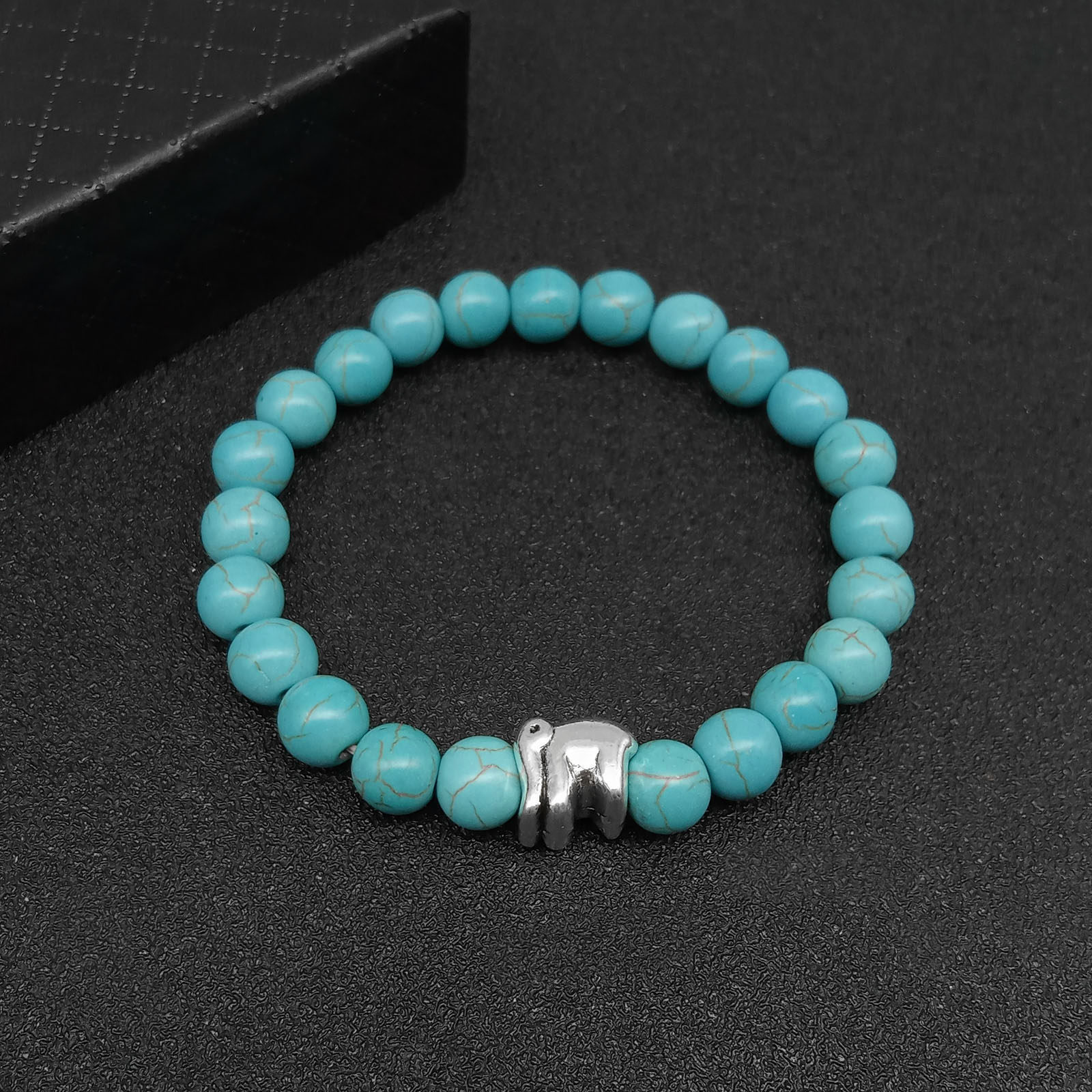 2:Elephant - turquoise Hand String