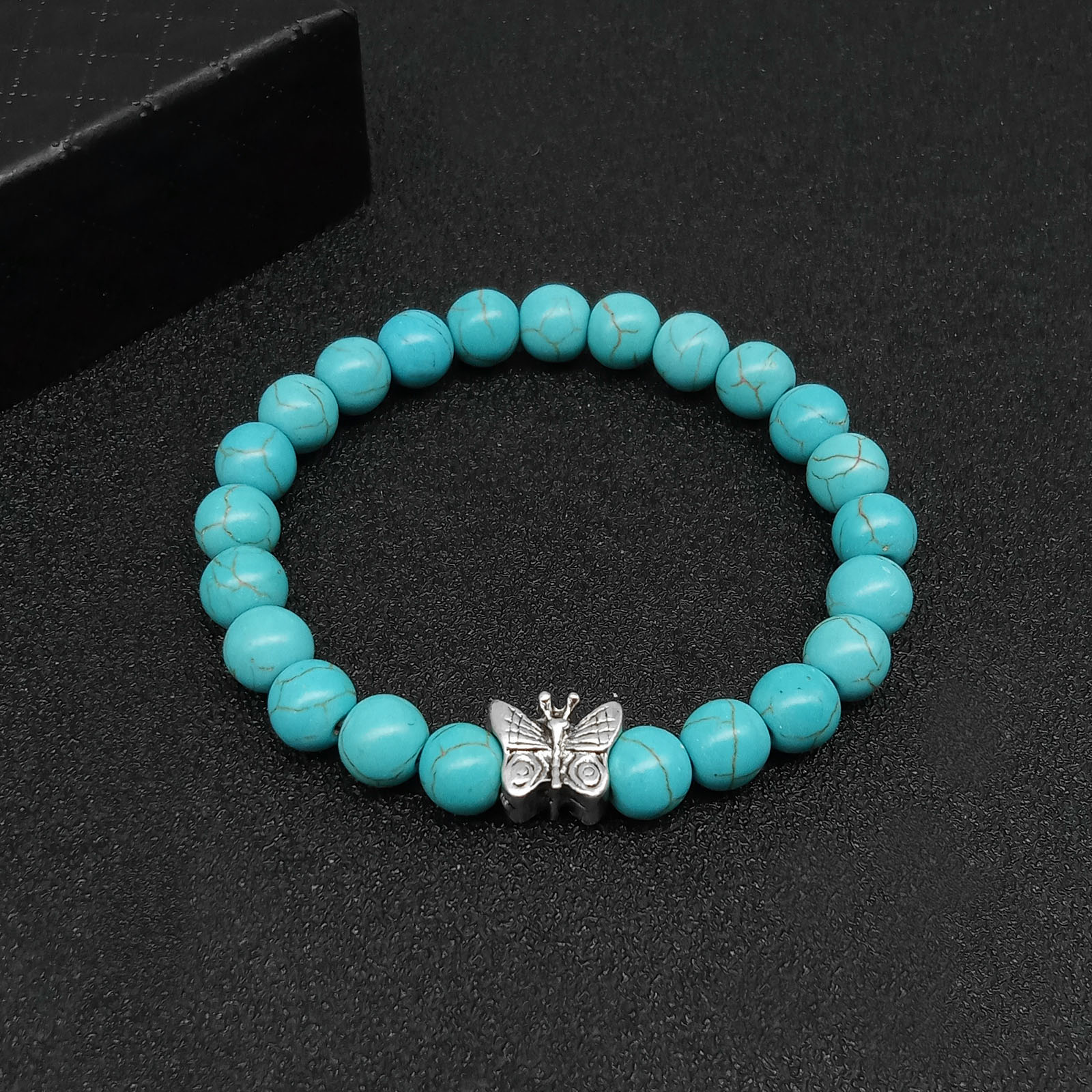 7:Butterfly turquoise Hand String