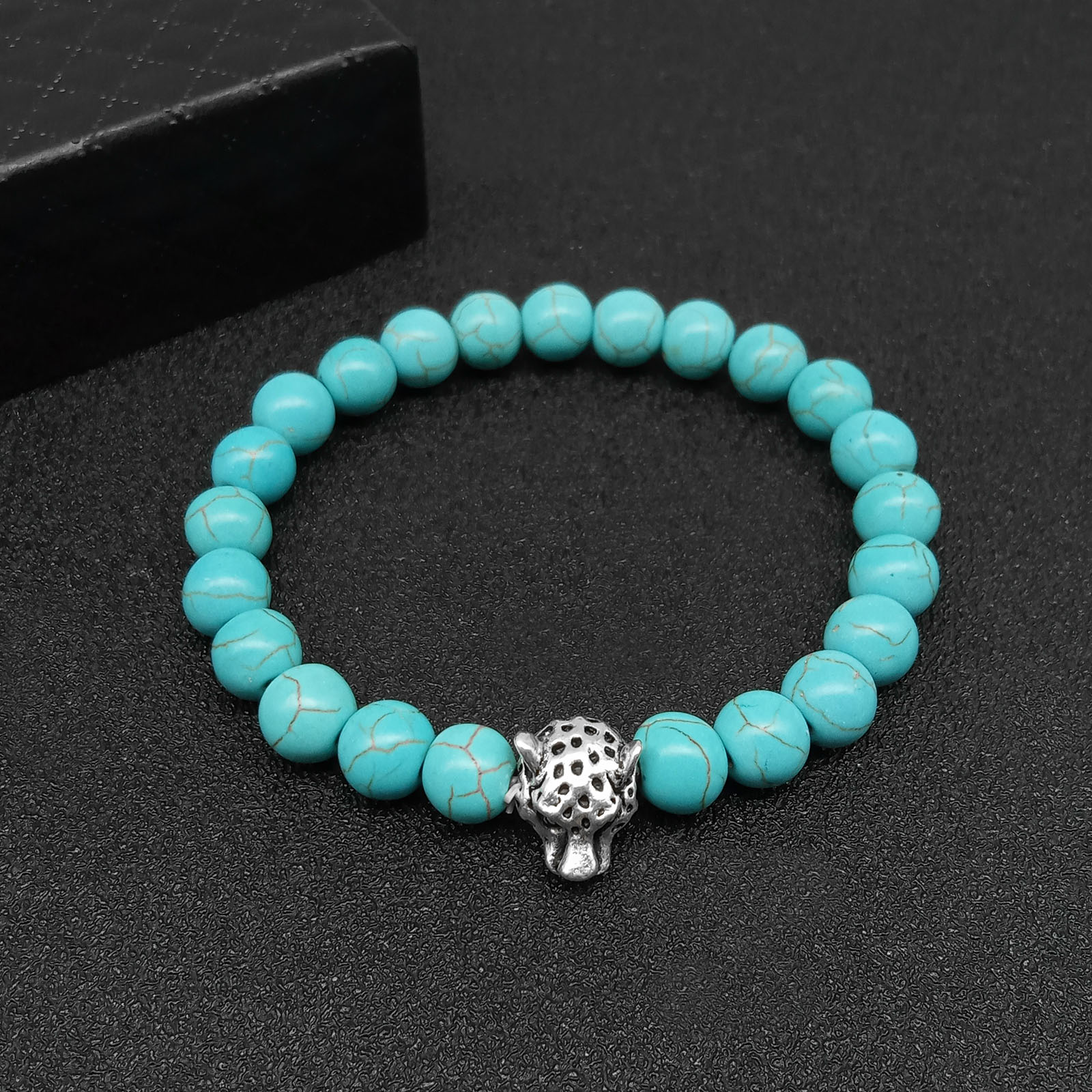 Leopard Head 2 - turquoise Hand String