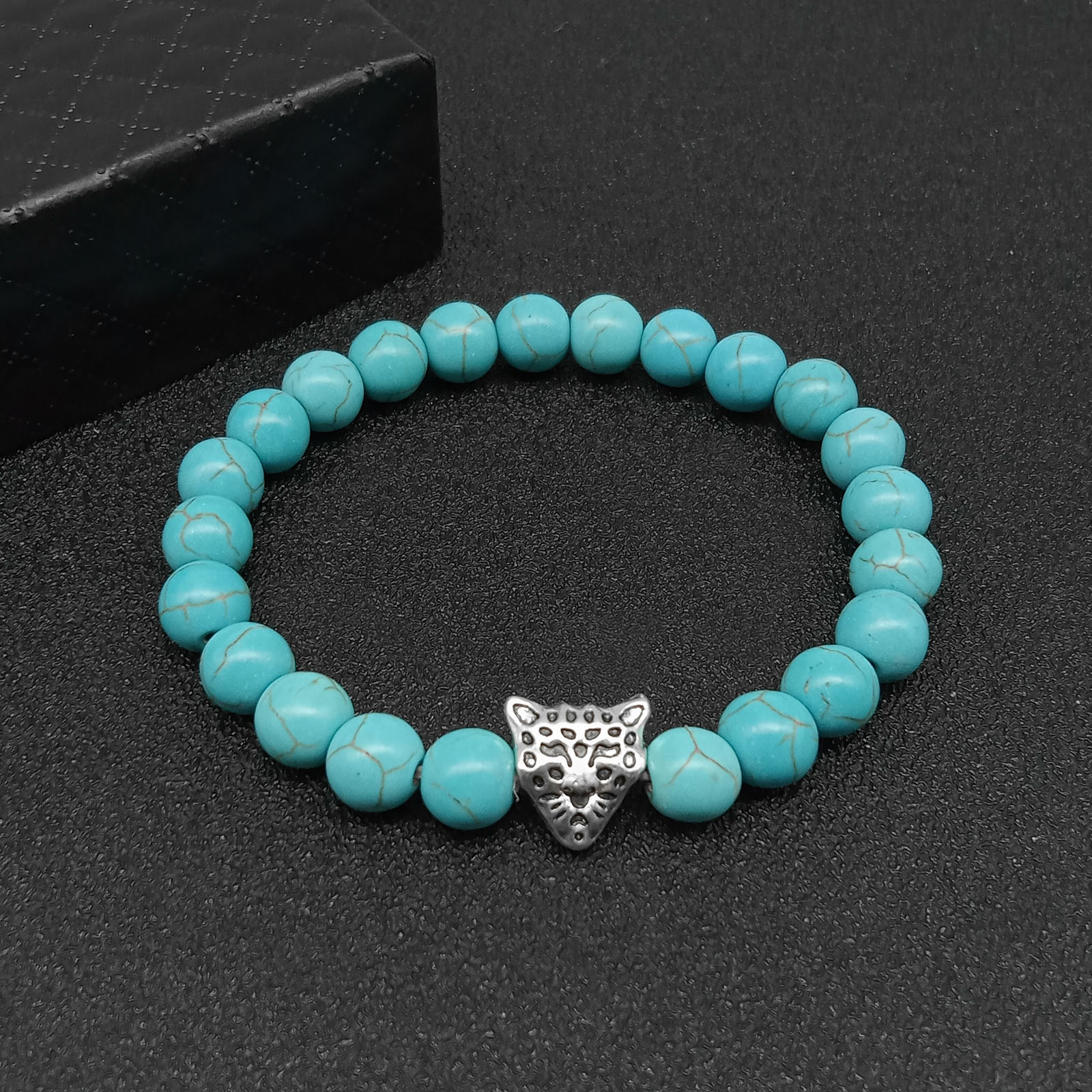 Leopard Head 3 - turquoise Hand String