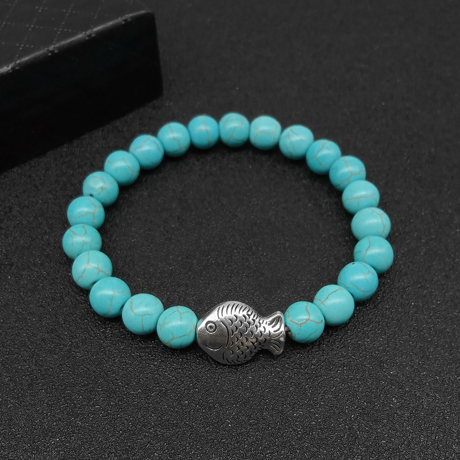 Little Fish - turquoise Hand String