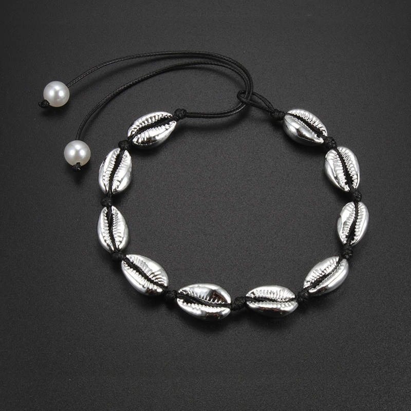 4:Silver shell with black thread