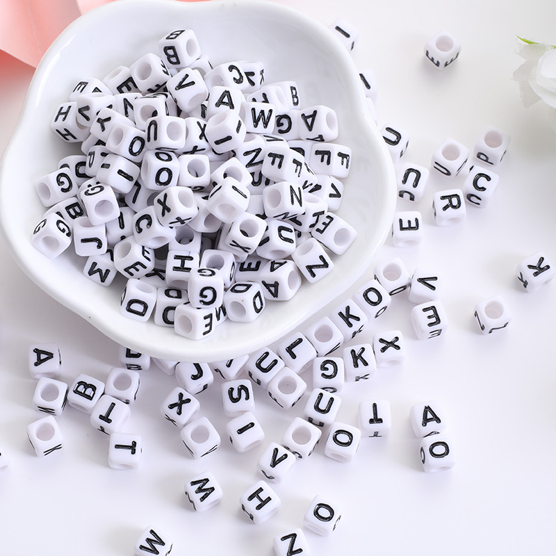 Black letters on white background  6*6mm about 300
