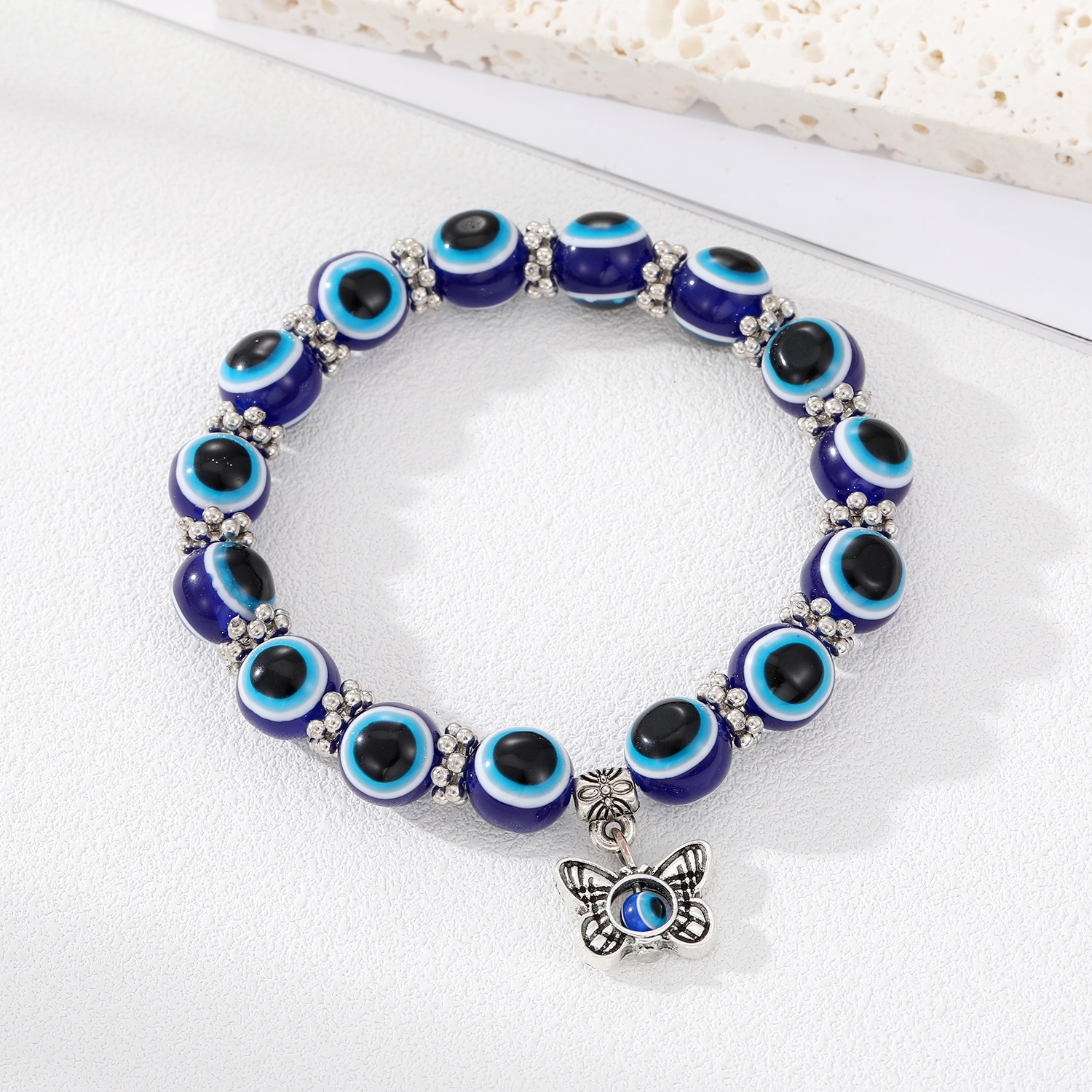 Blue butterfly bracelet with large beads