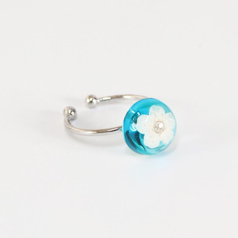 Transparent blue with white flowers