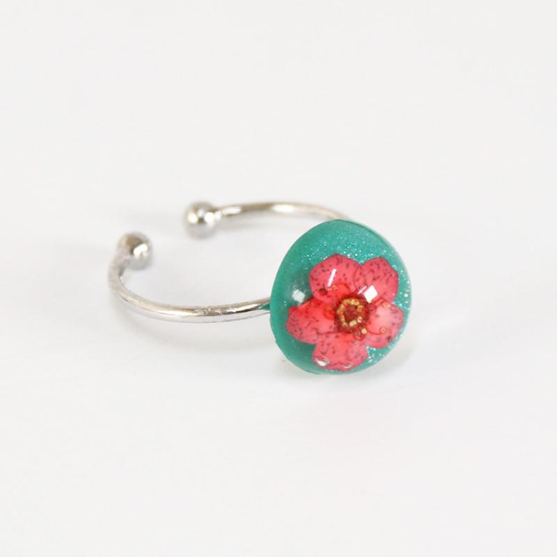 Pearlescent green with red flowers