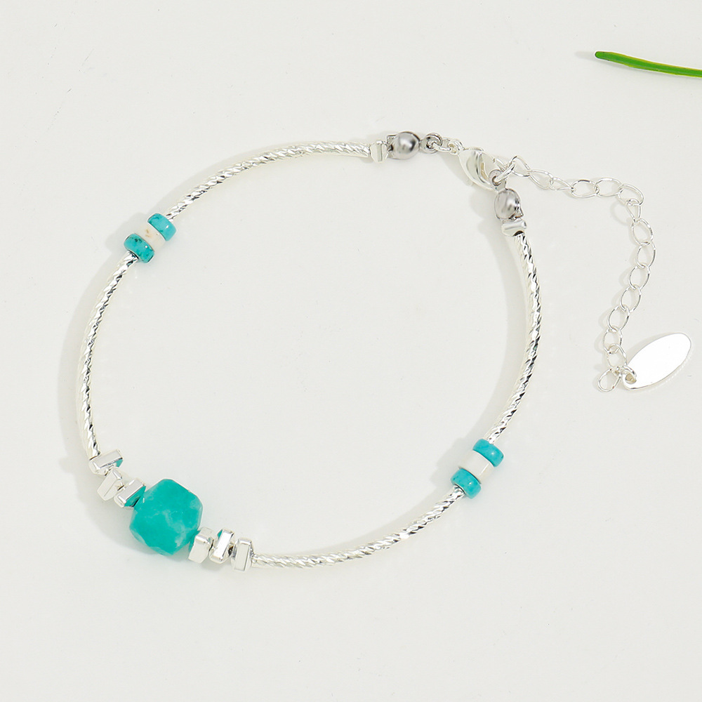 2:A turquoise bracelet
