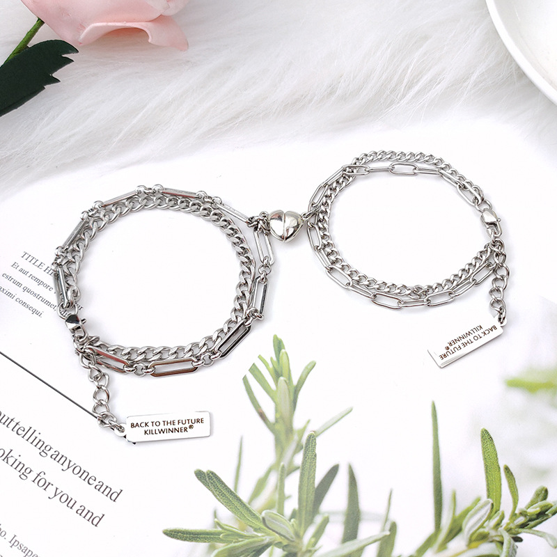 Double stainless steel love bracelet with a pair of black labels