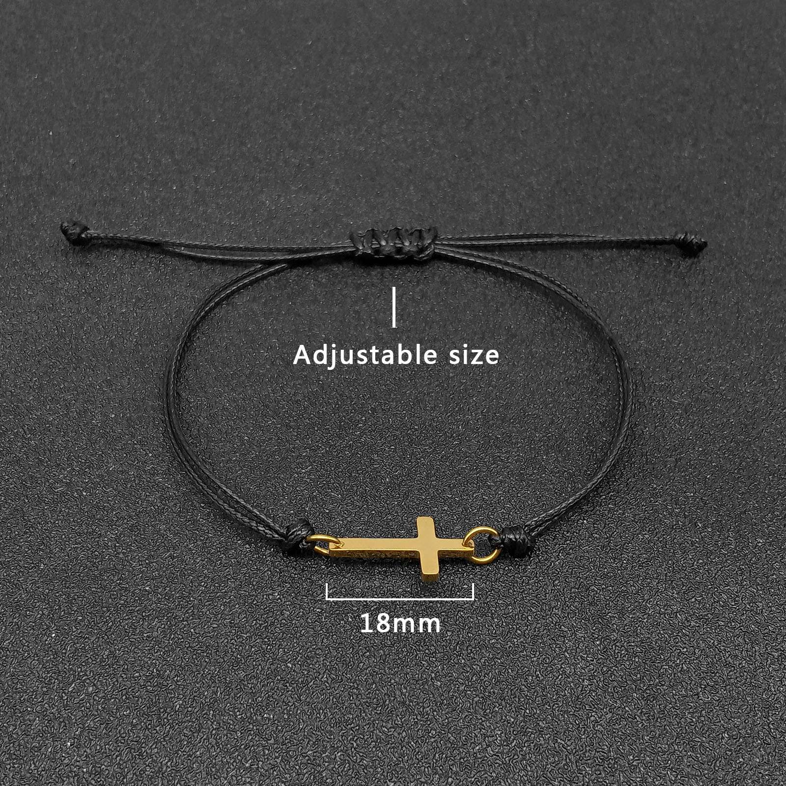 The cross is approximately 18mm long and the bracelet can be adjusted in size