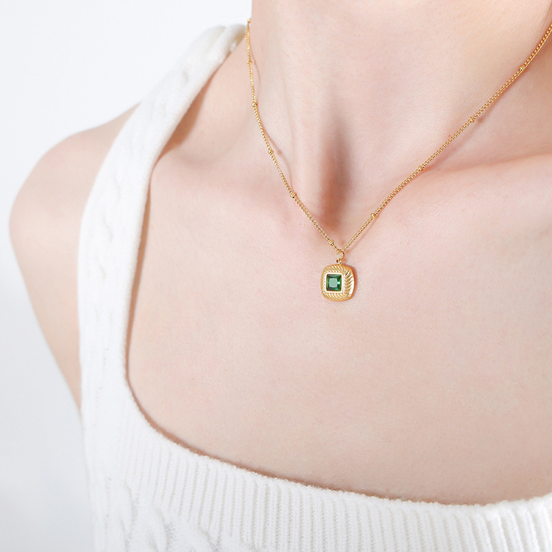 Gold emerald glass necklace