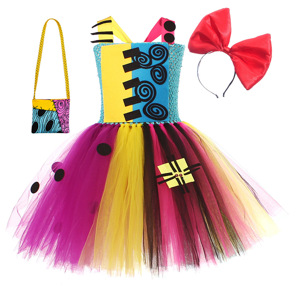 A dress with hair accessory and bag