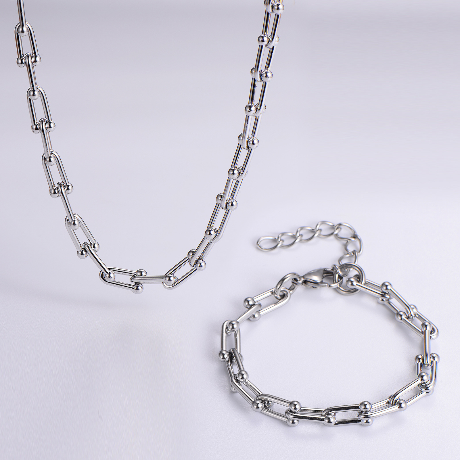 Steel bracelets and necklaces