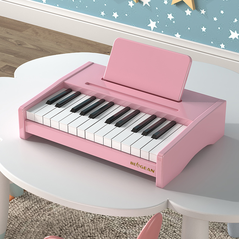 The tabletop model is painted pink with 25 keys