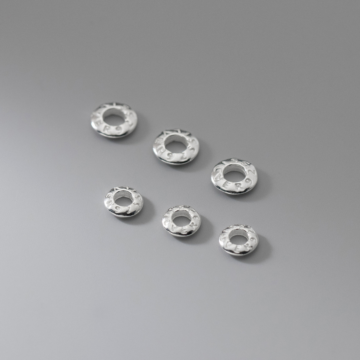 Plain silver, 7 mm in diameter